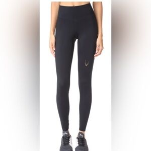 Lucas Hugh Performance Leggings. High Luxury Athletic brand. Back Zip Pocket. XS